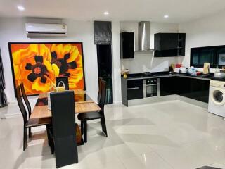 Modern kitchen with dining area