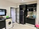 Modern kitchen with appliances and washing machine