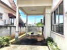 Covered patio with seating area