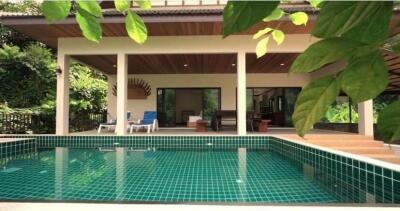 Covered patio area with swimming pool