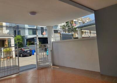 Covered carport with gated entrance