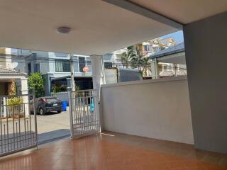 Covered carport with gated entrance