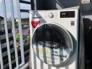 Outdoor laundry area with a modern washing machine