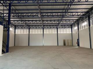 Spacious industrial warehouse with open floor plan