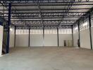 Spacious industrial warehouse with open floor plan