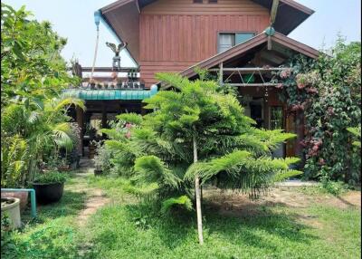 Front view of a house with a garden