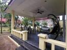 Outdoor patio with seating and hanging chair