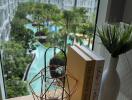 View of complex courtyard from window with decorative items on the sill