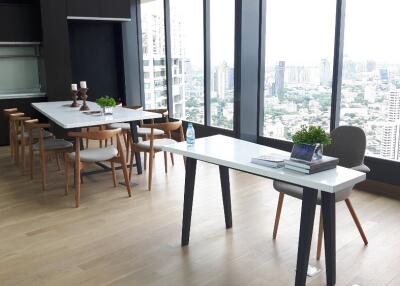 Modern dining area with a city view