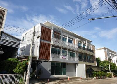 Front view of a modern multi-story residential building