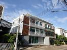 Front view of a modern multi-story residential building