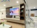 Modern living room with wall-mounted TV and contemporary decor