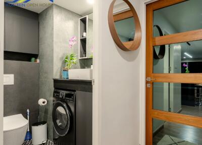 Bathroom and laundry area with modern amenities