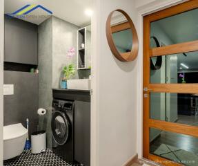 Bathroom and laundry area with modern amenities