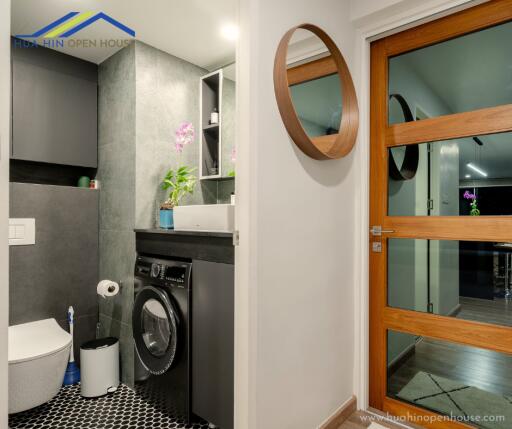 Bathroom and laundry area with modern amenities