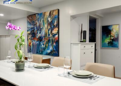 Modern dining area with artistic decor