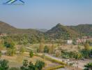 Scenic view of surrounding hills and greenery