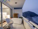 Balcony with ocean view and outdoor bathtub