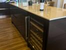 Modern kitchen island with wine fridge