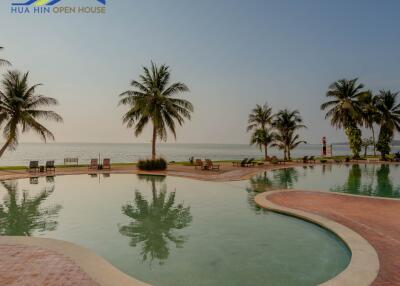 Outdoor pool area with ocean view