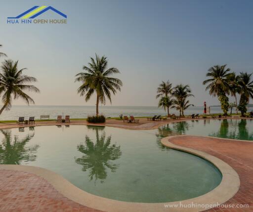 Outdoor pool area with ocean view