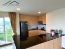 Modern kitchen with black countertop