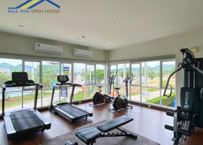 Apartment gym with fitness equipment