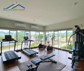 Apartment gym with fitness equipment