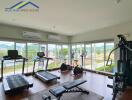 Apartment gym with fitness equipment