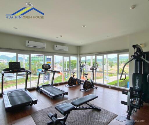 Apartment gym with fitness equipment