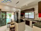 Modern kitchen with island and pendant lights