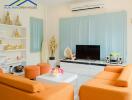 Bright and modern living room with orange sofas and decorative elements.