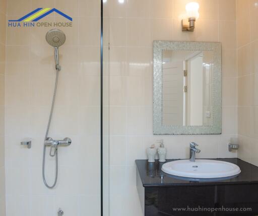 Modern bathroom with a shower and vanity