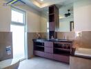 Modern bathroom with large mirror and wooden cabinets