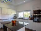 Modern kitchen with island and appliances