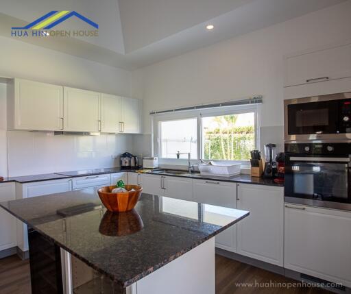 Modern kitchen with island and appliances