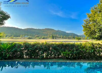 Scenic view with pool and mountain landscape