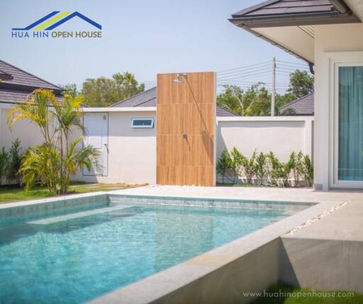 Swimming pool area with outdoor shower