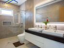 Modern bathroom with double sink and shower