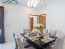 Dining room with a set table and modern decor