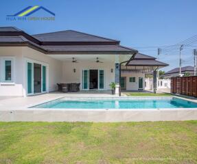 View of a modern house with a swimming pool