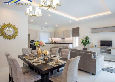 Modern living room and dining area with elegant decor