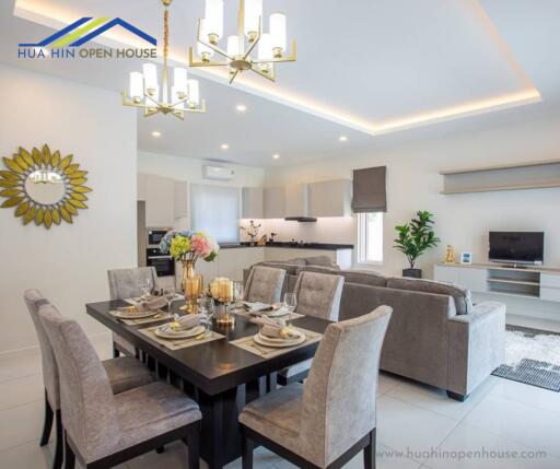 Modern living room and dining area with elegant decor