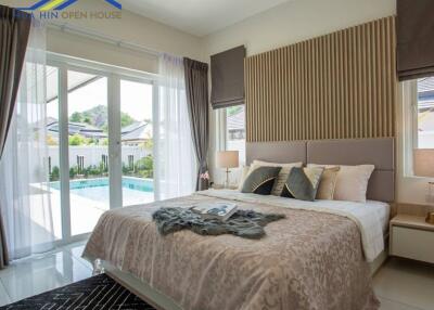 Cozy bedroom with pool view
