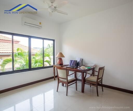 Home office with table and chairs