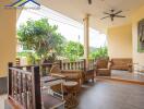 Outdoor covered patio with seating area