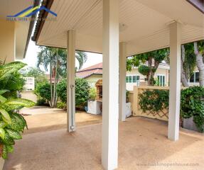 Covered outdoor area with supporting pillars