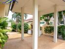 Covered outdoor area with supporting pillars