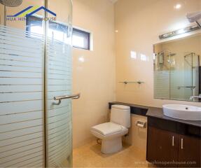 Modern bathroom with shower and vanity