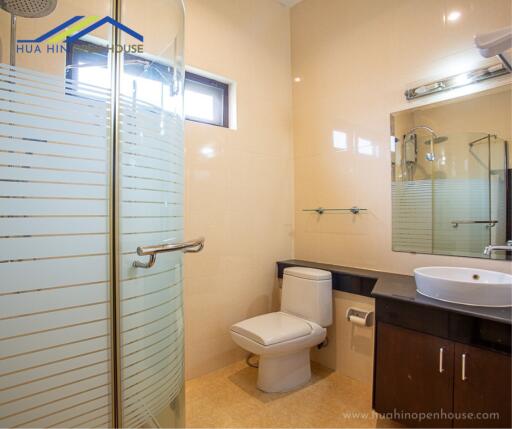 Modern bathroom with shower and vanity